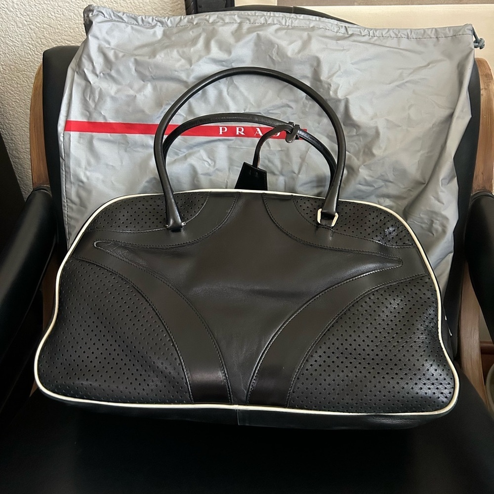 Rare vintage PRADA 'Vitello Drive' Black Leather Bowling Bag modeled by Gisele - Picture 5 of 16